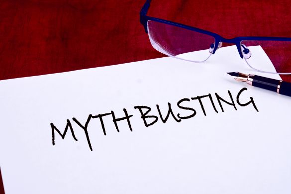 Pen and paper with text that says Myth Busting